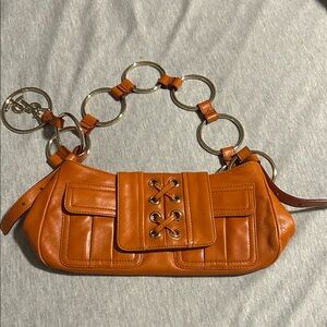 Yves Saint Laurent Stylish orange Leather Bag with Chain Strap